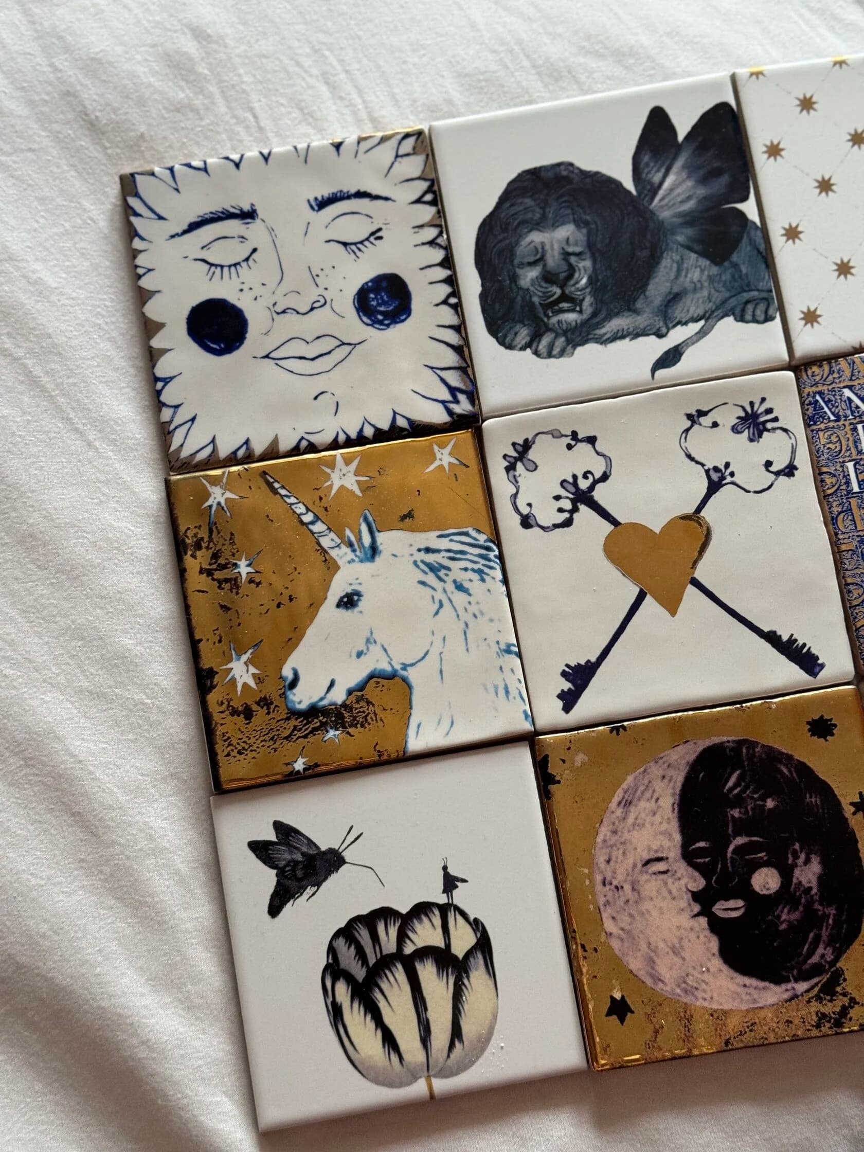 Set of 11 ceramic tiles “Fairy Tables’ images Compendium”